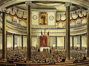 Nationalversammlung in der Paulskirche. Ernst Moritz Arndt saß als Alterspräsident in dem ersten Demokratischen Parlament und setzte seine Unterschrift unter die Paulskirchenverfassung.